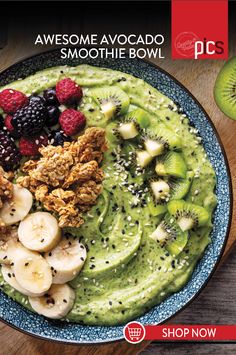 a bowl filled with green smoothie, bananas and kiwis