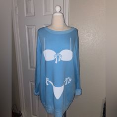 New With Tags. Bikini Bod Roadtrip Sweater. Extra Long And Loose Featuring A Super Oversized, Roomy Fit In A Soft Sherpa Fleece. In Sand Castle. Fiber Content: 70% Cotton, 30% Polyester. Fit Loose Intended. Size S Smoke And Pet Free Home. Blue Long Sleeve Tops For Poolside, Spring Beachwear Tops For Lounging, Light Blue Long Sleeve Tops For Beach Season, Blue Tops For Loungewear During Beach Season, Casual Blue Crew Neck Swimwear, White Crew Neck Top For Poolside, Stretch Cotton Beachwear Top, White Relaxed Fit Top For Poolside, Stretch Beachwear Top For Loungewear