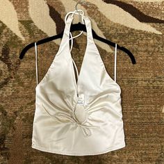 Work Once, Very Cute Top!! Received A Lot Of Compliments. No Stains, In Almost Brand New Condition!! Key Hole Area Adjusts In Size. Fitted Satin Tops For Spring, Cream Tops For Summer Night Out, Cream Top For Summer Night Out, Spring White Halter Top For Party, White Halter Top For Spring Party, Satin Crop Top For Summer, Summer Night Out Cream Tops, Cropped Halter Top For Spring Evening, Spring Halter Neck Satin Top