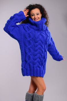 "Brand new chunky knit Sweater in Royal blue Color. Turtleneck collar. Super chunky and warm. This super big and trendy sweater is soft and warm. Easy to combine with jeans /skirts. Matching leg warmers available. Materials : Soft premium quality soft bulky wool. Color: Royal blue Measurements : Body length: 28 \" / 72 cm Chest width: 20,5 \" / 52 cm Sleeve measured from the neckline to the end of the cuff: 28 \" / 71 cm Neck unrolled - 16''/ 40 cm All the measurements are taken with the item fl Winter Long Sleeve Chunky Knit Turtleneck, Cozy Knitted Turtleneck For Cold Weather, Winter Cable Knit Sweater With Funnel Neck, Cable Knit Funnel Neck Sweater For Winter, Oversized Blue Knitted Sweater, Chunky Knit High Neck Winter Sweater, Knitted Funnel Neck Sweater For Cold Weather, Cozy Blue Knitting Pattern For Fall, Blue Cozy Knitting Pattern For Fall