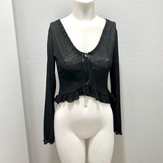 Black Slightly Sheer Ruffle Hem, Flirty Top With Drawstring Neckline. Front Is A Little Shorter Than The Back. Has Stretch, Vintage 90’s Never Worn Flirty Black Top For Fall, Flirty Black Top For Date Night, Fitted Vintage Top With Ruffles, Black Flirty Top With Ruffles, Vintage Black V-neck Top, Vintage Brown Top With Ruffles, Vintage Black Top With Lace Trim, Drawstring Neckline, Flirty Tops