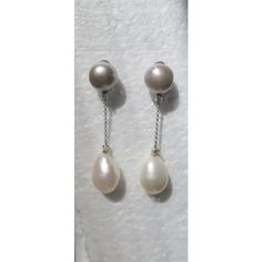 A beautiful pair of gray and white freshwater pearl and diamond dangle earrings set in 18-karat white gold, circa late-20th century, Made in Italy. Each earring has a grey freshwater pearl at top, diamond below it, 18-karat white gold link chain, followed by another diamond and a white freshwater pearl. Pearls have a beautiful luster. Earrings include 18-karat gold posts and backs. Each earring is marked '585', a European jewelry mark, and '750' for 18-karat gold. Dimensions: 1.88" Long.  Turquo European Jewelry, Metal Drop, Gold Link Chain, Gold Dangle Earrings, Diamond Dangle Earrings, Gold Link, Freshwater Pearls Earrings, White Freshwater Pearl, Pearl Diamond