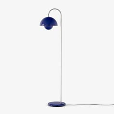 a blue floor lamp on a white background