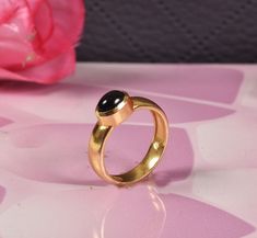 Onyx Ring/ Black Onyx Ring/ 14k gold filled onyx ring/ Silver onyx ring/ Minimalist Jewelry / Stackable/ Oval Onyx Ring/ Dainty onyx Ring Gemstone- Black,onyx Jewelery Category:- Handmade -Ring Metal:-Brass -- T H E * Q U A L I T Y We buy raw gemstones directly from miners and then get them cut and polished at our workshop , Therefore saving some bucks (additional added fees and markups) avoiding a middle man and making sure of the authenticity of the gems. And we use top quality materials that Black Onyx Ring, Onyx Ring, Raw Gemstones, Black Rings, Metal Rings, Black Onyx, Minimalist Jewelry, Handmade Ring, Rings Statement