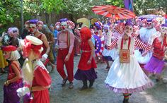 a group of people dressed in clown costumes