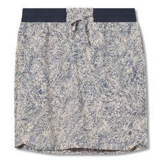 a blue and white skirt with an abstract pattern on the front, featuring a belted waist