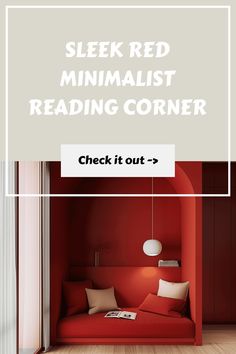 Sleek red minimalist reading corner with cushions and a hanging light.