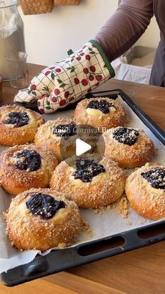 blueberry danish pastries on a baking sheet ready to be baked in the oven