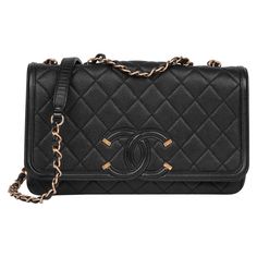 CHANEL Black Quilted Caviar Leather Medium Filigree Flap Bag Serial Number: 22644549 Age (Circa): 2017 Accompanied By: Chanel Dust Bag Authenticity Details: Serial Sticker (Made in Italy) Gender: Ladies Type: Shoulder, Crossbody Colour: Black Hardware: Gold Material(s): Caviar Leather Interior: Burgundy Leather Closure: Button Height: 17cm Width: 26cm Depth: 6cm Strap Drop: Single: 53cm Double: 28cm -The exterior is in excellent condition with light signs of use. -The interior is in excellent co Chanel Crossbody, Structured Shoulder, Chanel Vintage, Handbags Online, Black Quilt, Chanel Black, Black Hardware, Coco Chanel, Flap Bag