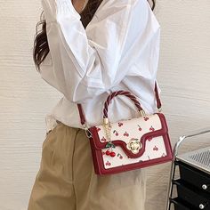 Aesthetic Cherry Print Crossbody Bag Elegant Red Bags With Lock, Elegant Red Shoulder Bag For On-the-go, Luxury Red Modern Satchel, High-end Red Satchel Box Bag, Red Crossbody Bag With Gold-tone Hardware, Bag Stand, Cherry Print, Modern Women, Sophisticated Design