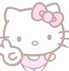 an image of a hello kitty smiling with her hand up to her ear and the word hello kitty written on it