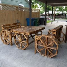 an outdoor table and chairs made out of wood