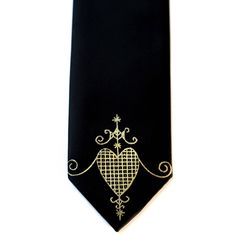 "Erzulie necktie. Veve for love, beauty, jewelery, dancing, luxury, and flowers. (We certainly approve of all of those.) Shown in the first photo - silver ink on black narrow. The tie is made of a soft microfiber, having almost the same hand as real silk and is printed with high-quality, non-toxic, waterbased ink. All new materials! Vegan safe. ► CHOOSE: standard, narrow or standard XL Silver ink on black Silver ink on charcoal Gold ink on olive Gold ink on burgundy ► CUSTOMIZE IT! You can get c Black Ties Jewelry For Gift, Black Jewelry With Ties For Gifts, Gift Black Jewelry With Ties, Elegant Gold Ties For Party, Elegant Adjustable Suit And Tie Accessories For Gifts, Elegant Gold Jewelry For Black Tie Event, Elegant Gold Jewelry For Black Tie, Elegant Adjustable Gold Tie, Elegant Adjustable Ties For Gift