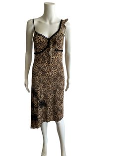 Liu Jo Y2K midi leopard dress , size S , stretchy , polyester and elastane. Very good condition 2000s Dress, Fitted Leopard Print V-neck Midi Dress, Leopard Print V-neck Mini Dress For Party, Elegant Leopard Print V-neck Mini Dress, Leopard Print V-neck Beach Dress, Leopard Print Stretch V-neck Dress, Midi Slip Dress, Lace Slip, Leopard Dress