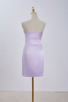 The strapless lavender tight short dress is made of luxurious satin, with a vibrant color that catches the eye. Its bodycon silhouette and crepe neck embellishment give it a sleek and sophisticated look. The dress features a side zipper for easy wear and falls above the knee for a flattering fit. Item #NP1114 Material: Satin Color: Lavender Silhouette: Bodycon Embellishment: Crepe neck Neck: Strapless Back: Side zipper Length: Above knee length Fully lined: Yes Built-in bra: Yes True to size. Made in China. Dresses are usually packed inside out for protection. Hand wash Evening Purple Strapless Bodycon Dress, Evening Strapless Purple Bodycon Dress, Purple Strapless Evening Bodycon Dress, Strapless Purple Bodycon Evening Dress, Elegant Purple Strapless Dress For Night Out, Lavender Strapless Mini Dress For Party, Purple Sheath Bodycon Dress For Evening, Purple Sheath Bodycon Evening Dress, Chic Fitted Purple Strapless Dress