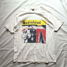 a white t - shirt with the words radiohead on it