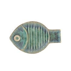 a fish shaped ceramic object on a white background with blue and green stripes in the shape of a fish