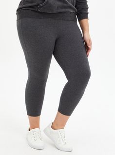 Our highly rated and expertly designed legging has a comfortable waistband that's narrow but still holds you in with a streamlined effect. Jersey knit fabric. High waist. Narrower waistband. Tapered leg. Opaque - never see-through. CONTENT + CARE Cotton/spandex. Wash cold; dry low. Imported plus size leggings. SIZE + FIT Model is 5’10”, size 1 . 24” inseam. The best plus size women's crop comfort waist premium legging hosiery & socks in grey made of premium. Gray High-waist Leggings For Loungewear, Casual Full-length Gray Leggings, Versatile Full-length Gray Leggings, 4-way Stretch Sports Leggings Capri Length, Cheap Sporty Capri-length Leggings, Premium Leggings, Plus Size Leggings, Women Crop, Jersey Knit Fabric