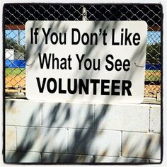 a sign that says if you don't like what you see volunteer