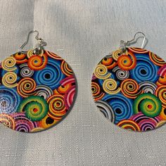 Multi Colored, Large, Round Earrings. Multicolor Hand Painted Earrings, Retro Multicolor Drop Earrings, Multicolor Round Earrings For Summer, Vibrant Colorful Earrings For Gifts, Orange Round Earrings For Summer, Retro Multicolor Jewelry For Festivals, Multicolor Retro Festival Jewelry, Multicolor Circular Hoop Earrings For Festivals, Multicolor Circular Summer Earrings