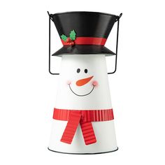 a white snowman with a black hat and red scarf on it's head