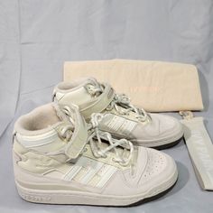 New, Never Worn (No Box) *See Pictures. Adidas X Ivy Park Forum Mid 'Icy Park Cream White' High Top Sneakers. Size: 5 Women’s Comes With Dust Bag & Strap Style: Gw2857 Colorway: Alumin/Cream White/Gum * Smoke-Free Home Thank You For Looking Let Me Know If You Have Any Questions. Check Out My Other Items Cream High-top Sports Sneakers With Laces, Sporty Custom Beige Sneakers With Laces, Cream High-top Sneakers With Laces For Sports, Cream High-top Sneakers With Laces, Sporty Custom Beige Sneakers, Sporty Cream Lace-up High-top Sneakers, Cream Lace-up Basketball Shoes With Boost Midsole, Cream Sporty Basketball Shoes For Streetwear, Cream Basketball Shoes With Boost Midsole For Streetwear