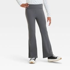 Bring a fashionable twist to their casualwear closet with these Foldover Flare Pants from art class™. These full-length pants in a solid hue feature a flared cut with a high-waist for a boost of style. The lightweight jersey fabric with added stretch offers breathable comfort, while the wide full elastic waistband offers a secure fit. They can pair it with a variety of tees, sweatshirts and hoodies for versatile outfit options. art class™: One-of-a-kind looks for the one and only you. Outfit Options, Ribbed Leggings, Sweatshirts And Hoodies, Versatile Outfits, Flare Leggings, Girls Leggings, Kids Outfits Girls, The One And Only, Bottom Clothes