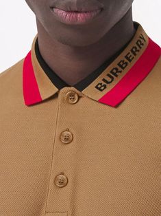 Burberry collar-stripe Logo Piqué Polo Shirt - Farfetch Classic Polo Shirt With Signature Stripes, Classic Collared Polo Shirt With Signature Stripes, Luxury Polo Shirt With Striped Collar, Luxury Short Sleeve Polo Shirt With Striped Collar, Classic Polo Shirt With Striped Johnny Collar, Classic Brown Polo Shirt, Classic Brown Polo Shirt With Collared Neckline, Collared Polo Shirt With Embroidered Logo For Work, Collared Polo Shirt With Embroidered Logo