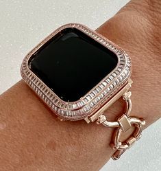 Looking for a stylish and glamorous addition to your Apple Watch? Look no further than our Minimalist Designer Rose Gold Circle Link Apple Watch Band! This band is specially made to fit Apple Watches in sizes 40mm, 41mm, 44mm, 45mm. Made of a Rose Gold Alloy for durability with fold over removable clasps.  What sets this band apart is its incredible shine and fold-over jewelry style closure. With this feature, you can easily adjust the band to fit wrist sizes from 5." to 7.8". Please measure you Rose Gold Rectangular Jewelry With Bracelet Strap, Rose Gold Rectangular Bracelet Jewelry, Rose Gold Bracelet Strap Apple Watch Band, Elegant Rose Gold Watches As Fashion Accessory, Rose Gold Apple Watch Band As Gift, Elegant Rectangular Watch Bracelet Strap Accessories, Rose Gold Apple Watch Band Gift, Rose Gold Rectangular Watch With Bracelet Strap, Rectangular Rose Gold Watch With Bracelet Strap