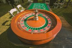 a rouleet sitting on top of a table in the middle of some chairs