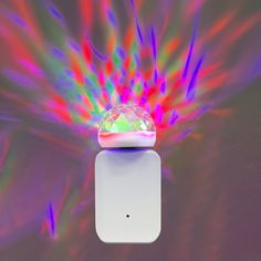 an electronic device with colorful lights in the background