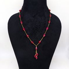 22kt yellow gold handmade charm necklace with 18-carat red ruby stone charm delicate jewellery. Metal-22kt yellow gold. Item type- Necklace. Length-18 inches to 26 inches. Ruby size-7 mm approx. Stamped-22kt hallmarked. Stone-ruby. Gross weight-20.770 grams for 18". Stone weight-18 carats(for 18")  Makes excellent giftng or collectible items. Formal 22k Gold Red Jewelry, Formal Red 22k Gold Jewelry, 22k Gold Red Jewelry, Yellow Gold Ruby Temple Necklace For Celebration, Red 22k Gold Necklace For Celebration, Red 22k Gold Round Necklace, Elegant Red 22k Gold Temple Necklace, Handmade 22k Gold Round Jewelry, 22k Gold Temple Jewelry Gift