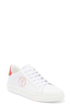 The brand's logo and a contrasting collar define a low-top sneaker shaped from smooth leather and secured with a classic lace-up closure. Leather upper/textile lining/synthetic sole Imported White Low-top Platform Sneakers With Logo Detail, Modern Platform Lace-up Sneakers With Logo Print, Modern Lace-up Sneakers With Logo Detail, Sporty Leather Platform Sneakers With Logo, Sporty Leather Platform Sneakers With Logo Detail, Lace-up High-top Sneakers With Logo, Sporty Platform Sneakers With Logo Detail And White Sole, Modern Low-top Platform Sneakers With Logo Print, Modern Low-top Sneakers With Logo