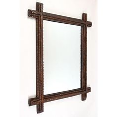 a mirror that is hanging on the wall