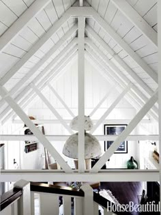 the inside of a house with white walls and ceilings