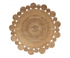 a round rug made out of jute and woven with circles in the center on a white background