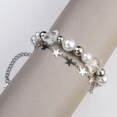 Silver Bracelets With Pearl Charm For Party, Silver Bracelet With Pearl Charm For Party, Trendy Star-shaped Bracelets For Party, Trendy Star Bracelet For Party, Trendy Silver Star Bracelet, Trendy Star-shaped Party Bracelet, Silver Pearl Jewelry With Star Charm, Star-shaped Beaded Party Bracelets, Trendy Star Charm Bracelet