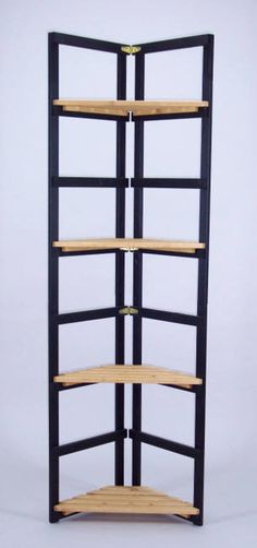 a wooden shelf with four shelves on each side and one in the middle, against a white background