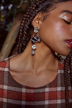 Accent your look with equestrian chic in a look that mixes gorgeous glam with a western motif. The Dark Horse drop earrings feature crystal cabochons, rhinestones and a bold black horse.Autumn Adeigbo styles are ethically made in NYC by female owned production facilities. Exclusive availabilityProduced in limited quantitiesGoldplate or Silverplate Autumn Adeigbo, Equestrian Chic, Horse Earrings, Black Horse, Dark Horse, Bold Black, Equestrian, Silver Earrings, Horses