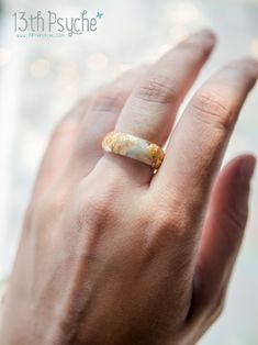 A beautiful clear and pale blue faceted resin ring with gold flakes inside. This resin ring is perfect for stacking! It's faceted all the way around and it is so comfortable to wear. All my resin rings are handmade with self-made molds. they are also hand-sanded and polished, to be smooth and comfortable to wear. Given the nature of the resin, my rings may contain tiny bubbles and imperfections, but I always try to make them as perfect as possible. The listing is for ONE stacking ring with metal Rings For Women Engagement, Promise Ring For Her, Engagement Ring Unique, Thumb Ring, Promise Rings For Her, Resin Ring, Gold Flakes, Unique Ring, Thumb Rings