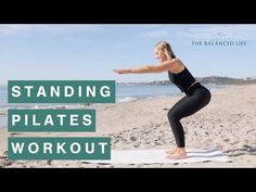 a woman standing on a yoga mat with the words standing pilates workout