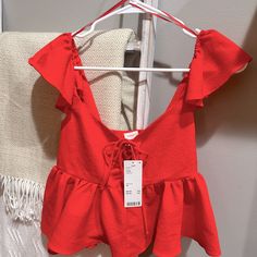 Urban Outfitters Red Crop Top With Tie In Front. Size Xs. New With Tags. Original Price $59.00 Red Short Sleeve Crop Top For Summer, Red V-neck Top From Urban Outfitters, Red Crop Top For Summer, Red V-neck Crop Top For Spring, Red Sleeveless Top For Day Out, Chic Red Crop Top For Vacation, Summer Vacation Red Blouse, Red Summer Blouse For Vacation, Red Summer Top For Day Out