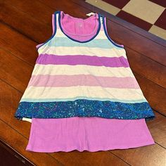 Nwt Justice Retail Store Layered Striped Tank Sequins Purple Blue Size 18 This Is A Double Tank Layered Look. The Striped Tank Is Attached To The Ribbed Tank Top Underneath. Blue Summer Sleepover Top, Purple Sleeveless Top For Playwear, Sleeveless Purple Tops For Playwear, Blue Spring Top For Sleepover, Multicolor Stretch Tops For Playwear, Stretch Multicolor Tops For Playwear, Casual Blue Tank Top For Playwear, Playful Fitted Purple Tops, Fitted Blue Tops For Sleepover