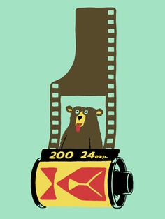 a bear sitting on top of a roll of film with the words zoo 24 hour