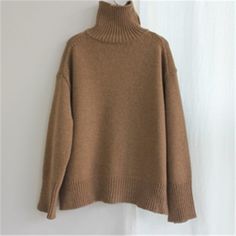 Material Composition: Polyester,AcrylicMaterial: PolyesterMaterial: AcrylicThickness: Thick （Winter)Gender: WomenTechnics: Computer KnittedSleeve Length(cm): FullPattern Type: SolidClosure Type: NoneCollar: TurtleneckItem Type: PulloversSleeve Style: REGULARStyle: Normcore/MinimalistDecoration: NONEClothing Length: REGULARModel Number: SW7400 Brown Winter Sweater Solid Color, Classic Brown Knitted Outerwear, Classic Knitted Brown Outerwear, Brown Turtleneck Outerwear For Fall, Casual Brown Turtleneck Sweater, Cozy Brown Turtleneck Top, Cozy Khaki Sweater For Fall, Oversized Taupe Sweater For Winter, Cozy Warm Brown Top