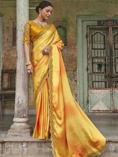 <ul>
<li style="text-align: justify;"><span data-preserver-spaces="true">Be an angel and create and ascertain a smashing effect on anybody by carrying this yellow satin trendy saree. The embroidered , sequines and lace work seems chic and fantastic for any occasion.</span></li>
<li style="text-align: justify;"><span data-preserver-spaces="true">Paired up this amazing look saree with similar yellow shade blouse in satin work with sequines and embroidery.</span></li>
<li style="text-align: justify Yellow Satin Saree, Trendy Saree, Party Wear Sarees Online, Party Sarees, Yellow Saree, Yellow Satin, Satin Saree, Embroidery Saree, Trendy Sarees