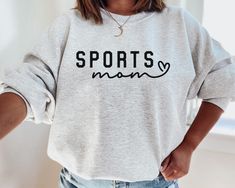 Sports Mom Sweatshirt This crewneck sweatshirt is pure comfort. Made from a soft cotton/poly blend with no itchy side seams, this is sure to become a staple. SIZE AND FIT: Your sweatshirt design will be printed on a high-quality, soft and comfortable unisex sweatshirt. Sizes run true to size, which takes the guesswork out of ordering; if you like your sweatshirts loose or oversized, you might want to order a size up and if you'd like a more fitted women's style then order a size down. Sizes rang Nurse Sweater, Back To School Gifts For Teachers, Open Zip, History Professor, Teacher Sweatshirt, Future Nurse, White Ash, Nurse Sweatshirt, Mama Sweatshirt