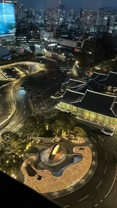 an aerial view of a city at night