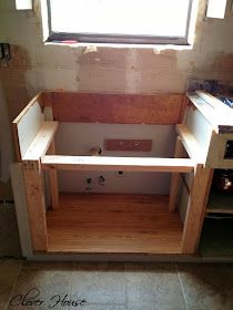 an unfinished bathtub in the corner of a room under construction