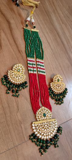 Jaipuri traditional rajwada very beautiful rani haar Women look beautiful  Kunden work Red, green and white Beads work Festival special rani haar Party special rani haar Wedding special rani haar Bollywood style rani haar Jaipuri Dupatta, Banarsi Blouse, Rani Haar, Blouse Designer, Beads Work, Bollywood Style, Feather Design, Diwali Decorations, Peacock Feathers